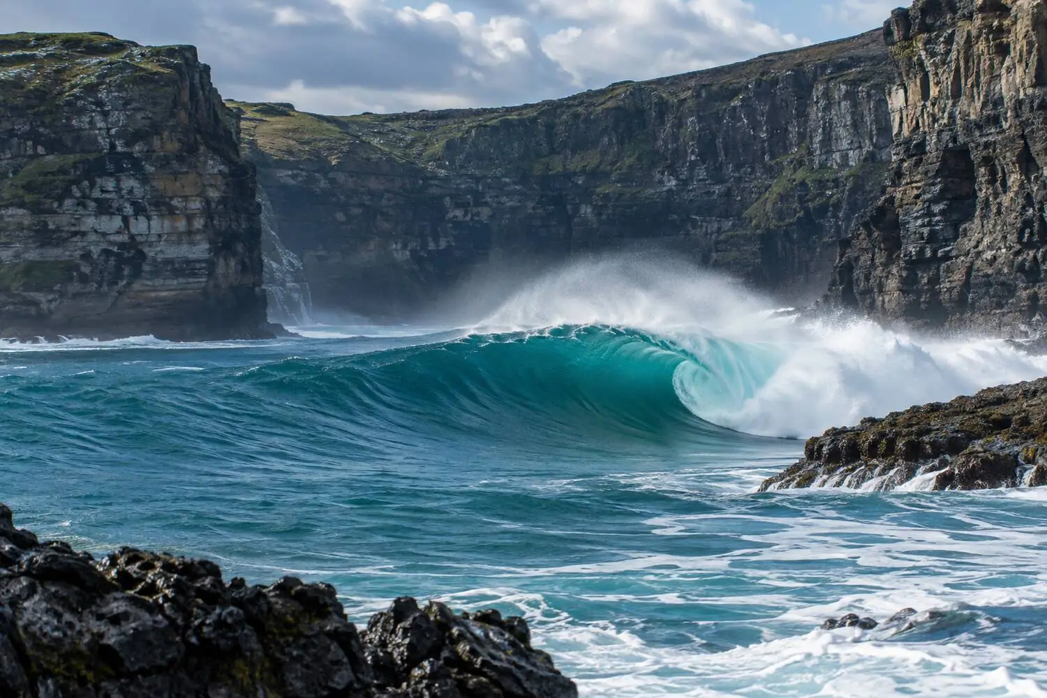 The powerful right-hand point wave peeling into Bells Beach bowl, Victoria